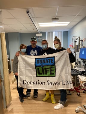 Holding Donation Saves Lifes Banner
